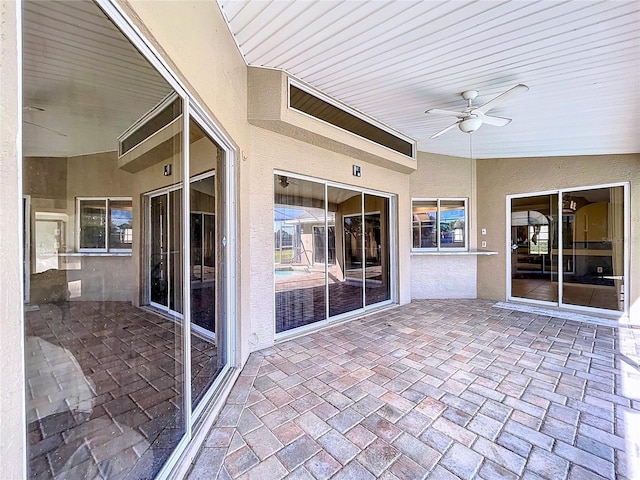 view of patio / terrace featuring ceiling fan