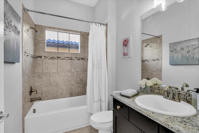 full bathroom featuring shower / tub combo with curtain, vanity, and toilet