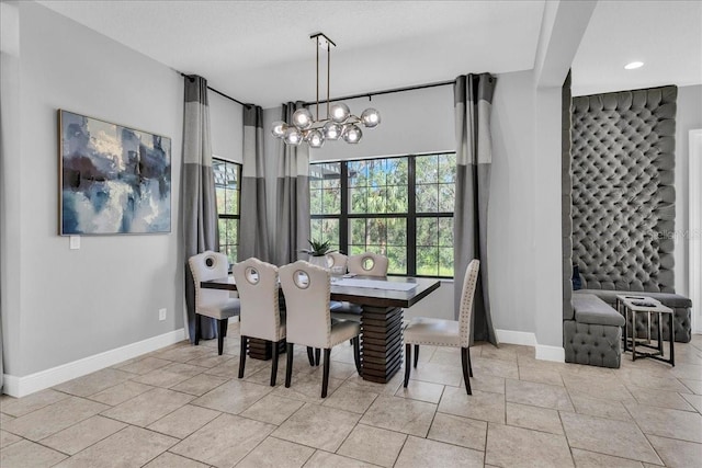 dining area with a notable chandelier