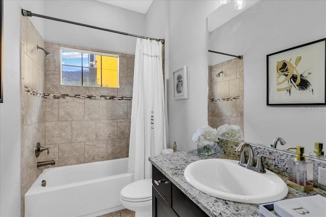 full bathroom featuring shower / tub combo with curtain, vanity, and toilet