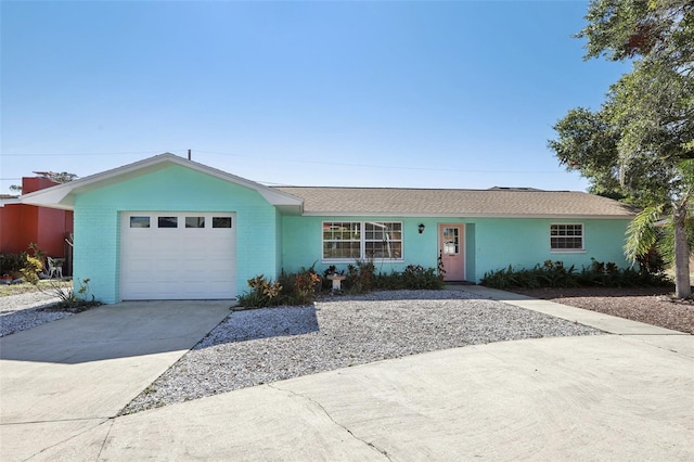 single story home with a garage