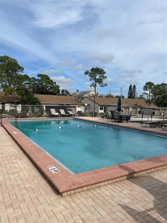 view of swimming pool featuring a patio