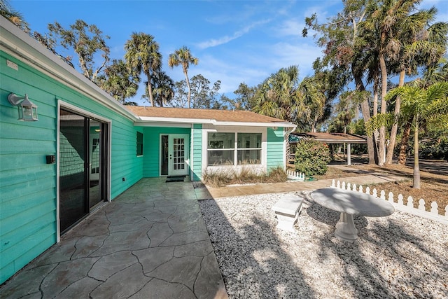 view of patio featuring a carport