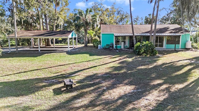 view of yard with a carport