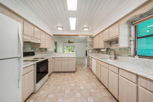 kitchen with backsplash, white appliances, ceiling fan, sink, and light brown cabinets