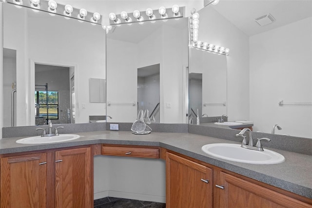 bathroom with tile patterned floors, vanity, and vaulted ceiling