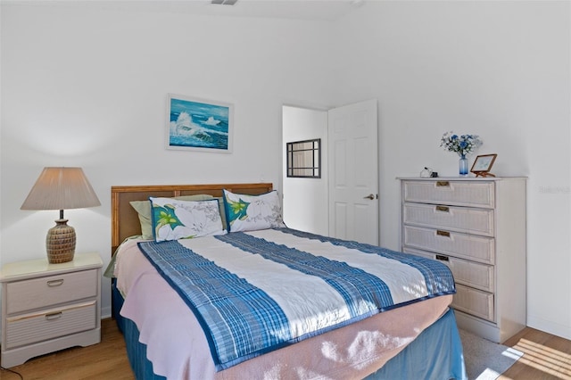 bedroom with light wood-type flooring