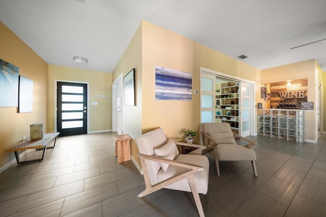 foyer featuring lofted ceiling