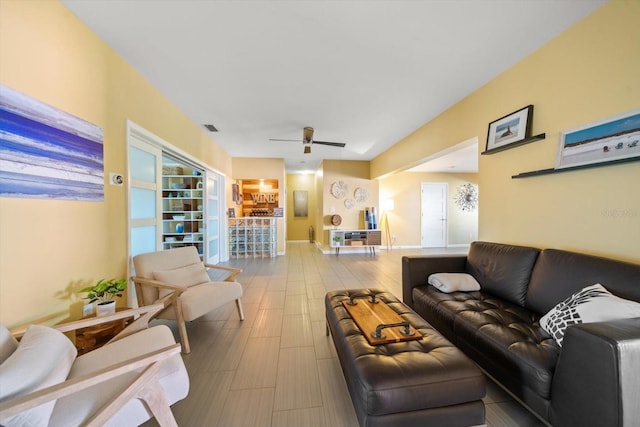 living room with ceiling fan