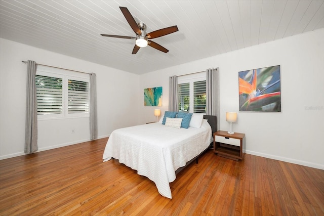 bedroom featuring ceiling fan and wood-type flooring