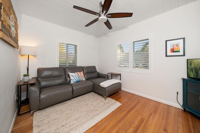 living room with ceiling fan, light hardwood / wood-style flooring, and a healthy amount of sunlight