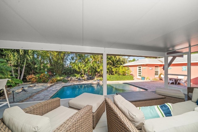 view of swimming pool featuring a patio area