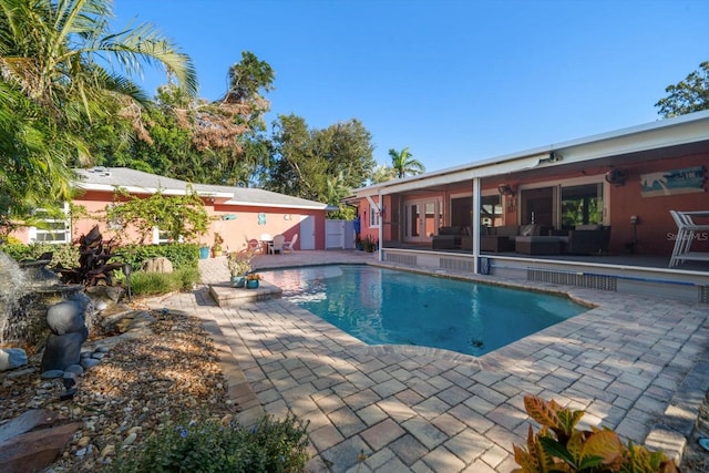 view of pool featuring a patio and an outdoor hangout area