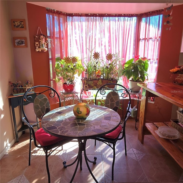 view of tiled dining space