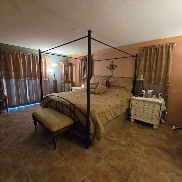 bedroom with a textured ceiling