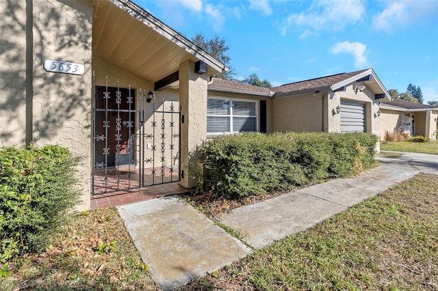 property entrance featuring a garage