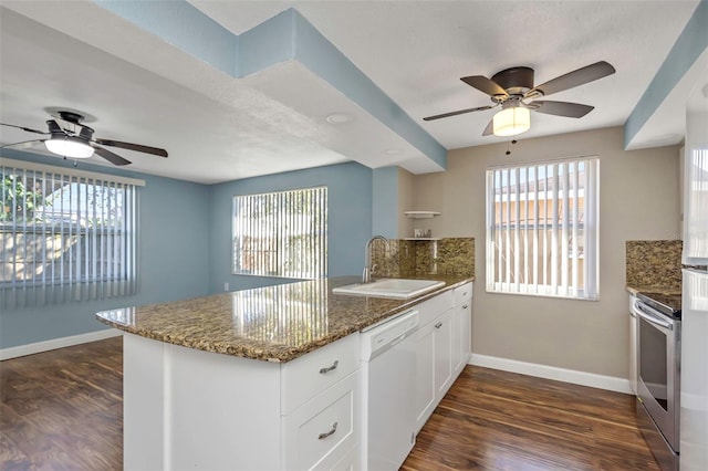 kitchen featuring white cabinets, sink, white dishwasher, and dark hardwood / wood-style floors