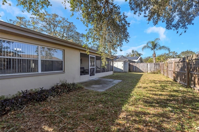 view of yard featuring a sunroom