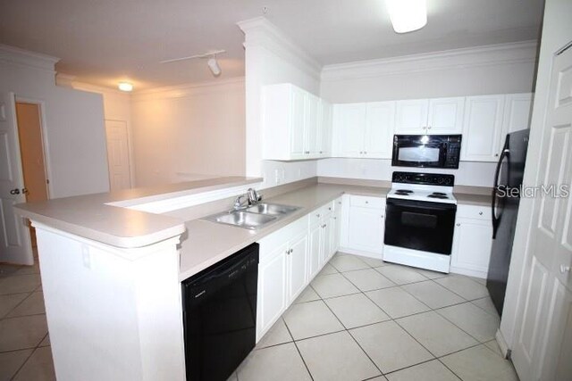 kitchen featuring sink, white cabinetry, black appliances, and kitchen peninsula