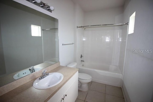 full bathroom featuring toilet, tile patterned flooring, vanity, and shower / bathing tub combination