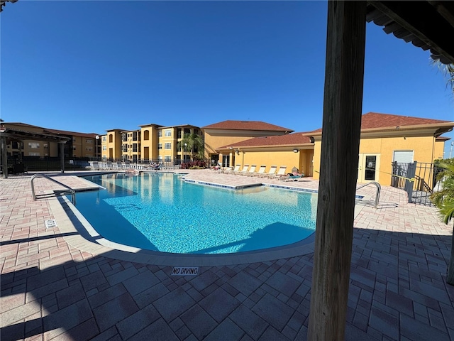 view of pool with a patio