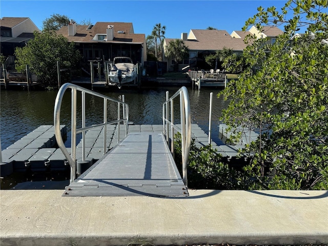 view of dock with a water view