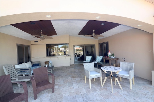 view of patio / terrace featuring an outdoor living space and ceiling fan