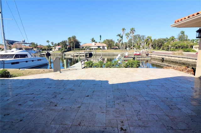 dock area with a water view