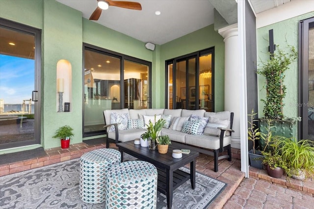 view of patio featuring ceiling fan and an outdoor hangout area