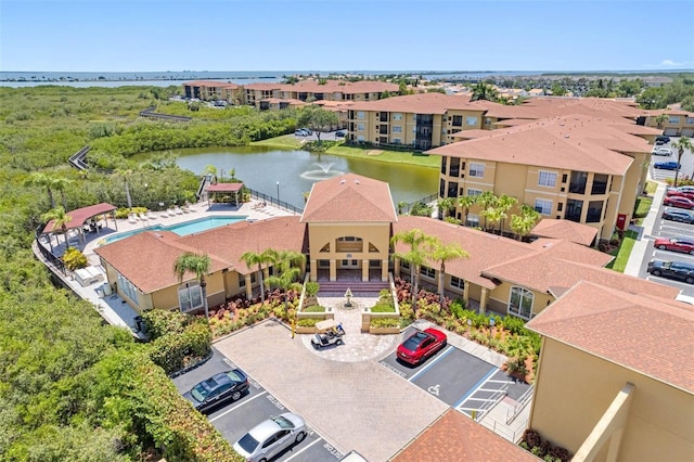 bird's eye view with a water view