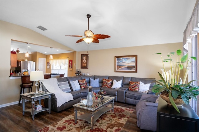 living room with dark hardwood / wood-style floors, vaulted ceiling, and ceiling fan