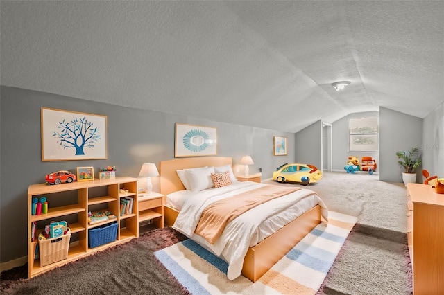 carpeted bedroom featuring lofted ceiling and a textured ceiling