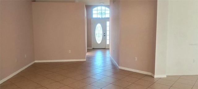 entrance foyer featuring light tile patterned flooring