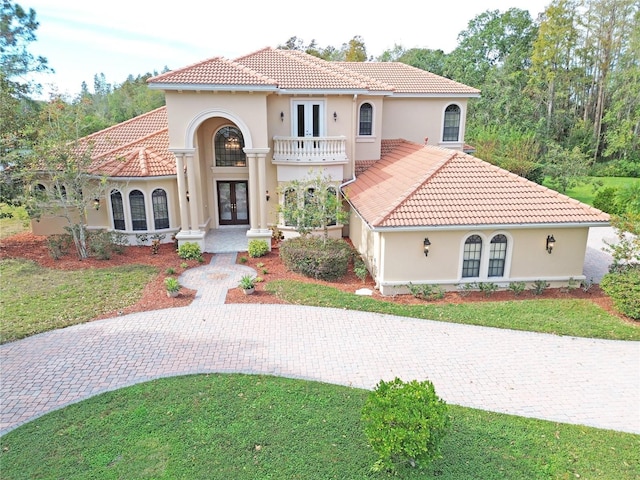 mediterranean / spanish house with french doors