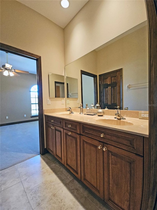 bathroom with vanity and ceiling fan