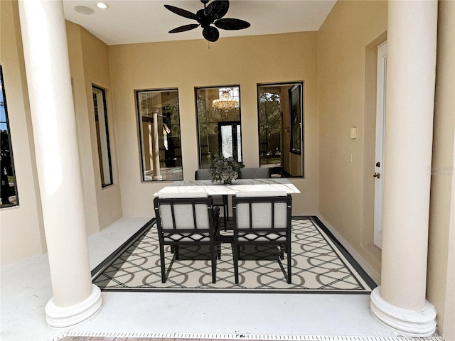 view of patio featuring ceiling fan