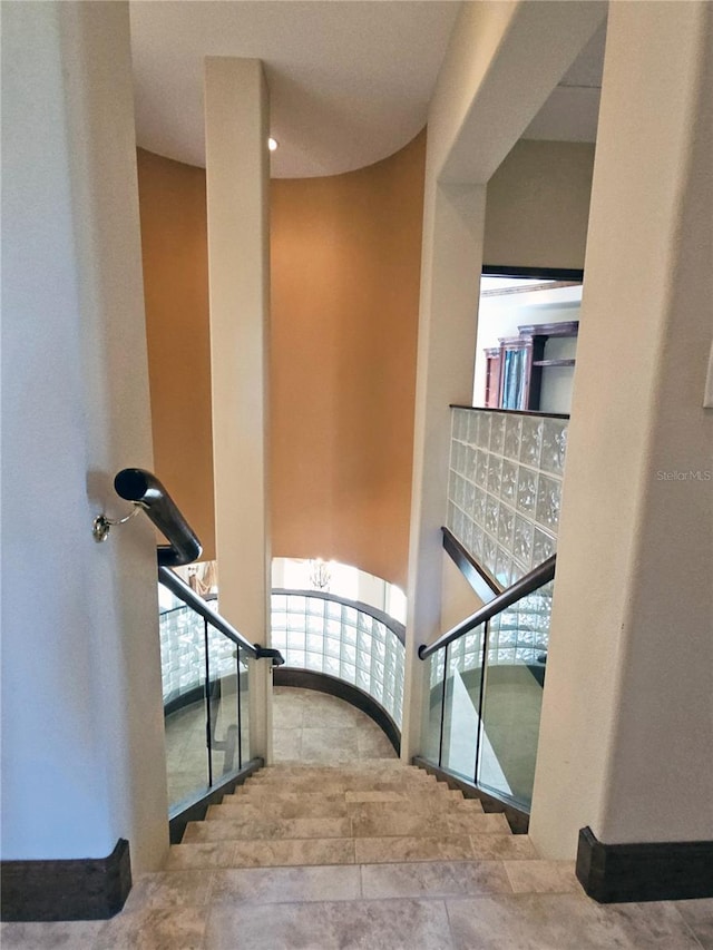 staircase featuring mail boxes