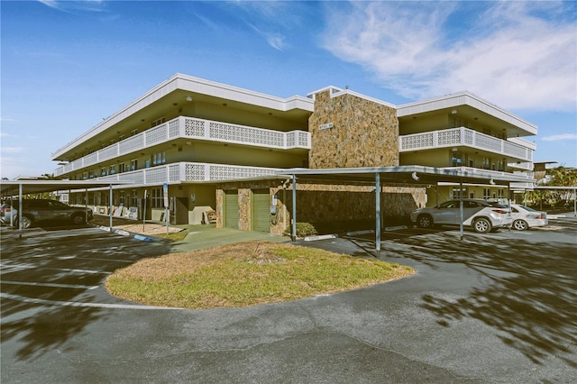 view of property featuring a carport