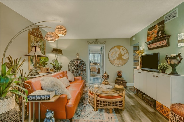 living room with light hardwood / wood-style floors