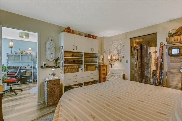 bedroom featuring light wood-type flooring