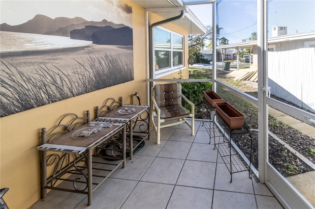 sunroom / solarium with a mountain view