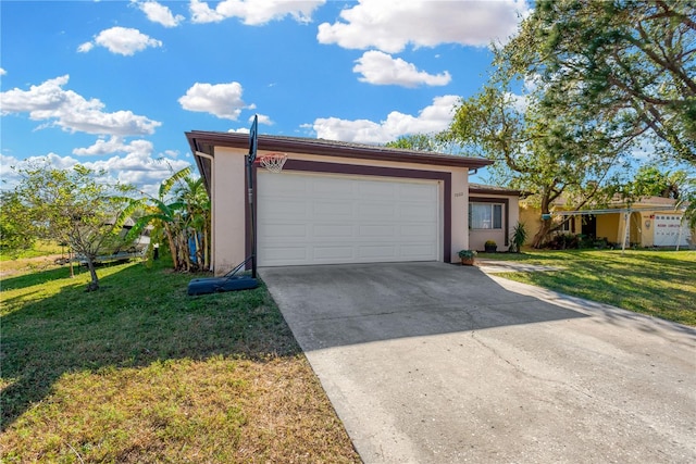 view of front of house featuring a garage and a front yard