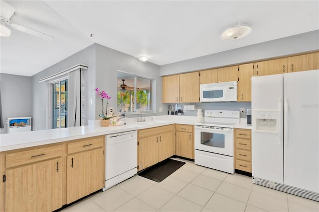 kitchen featuring ceiling fan, sink, white appliances, light brown cabinetry, and light tile patterned floors