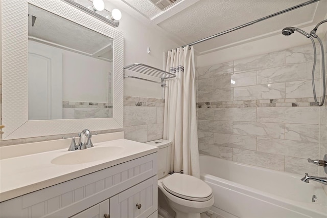 full bathroom with toilet, vanity, and shower / tub combo with curtain