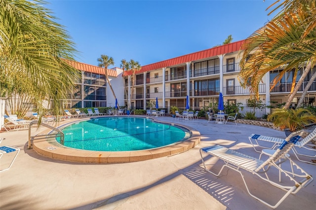 view of pool featuring a patio area