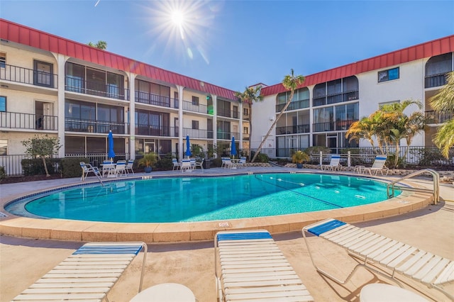 view of swimming pool featuring a patio