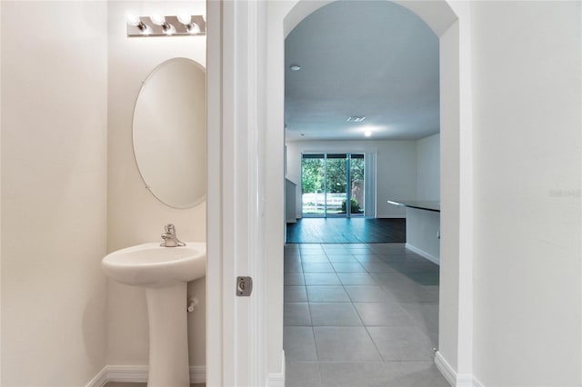 bathroom with tile patterned flooring