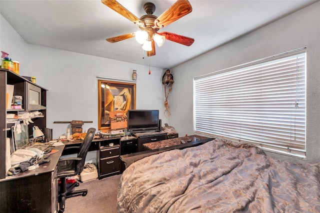 bedroom with light colored carpet and ceiling fan