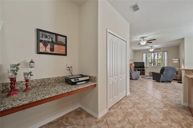 hallway with light tile patterned floors