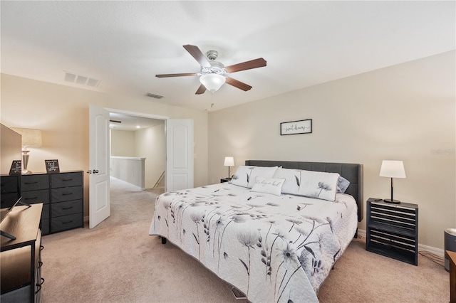 carpeted bedroom featuring ceiling fan